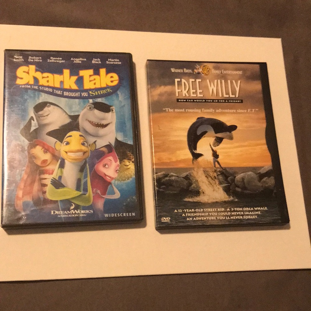 Two DVDs: Shark Tale and Free Willy Movies